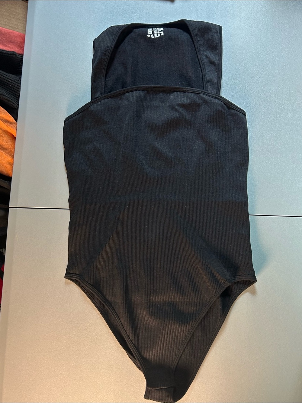 Women’s Black One-Piece Bodysuit
